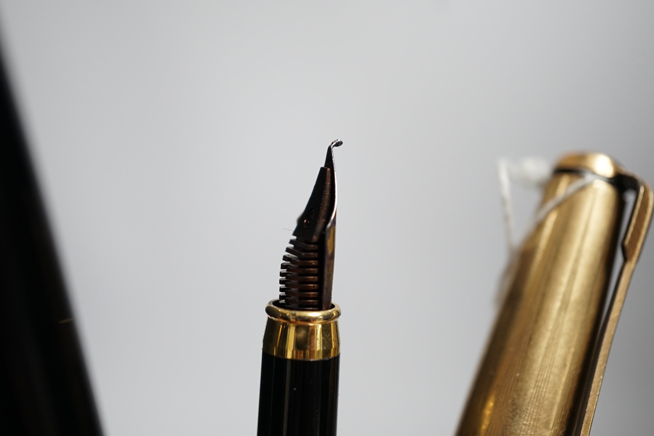 Five various pens including Parker and Reform